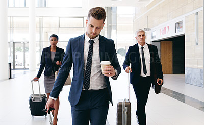Buy stock photo Travel, international meeting and business people walking in hotel, airport and reception area with suitcase. Teamwork, collaboration and group of managers travelling for global business meeting