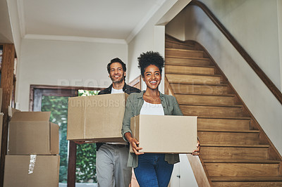 Buy stock photo Happy couple, real estate and moving in new home with boxes for renovation, investment or relocation. Interracial man and woman owner carrying box for property rent, mortgage loan or move together