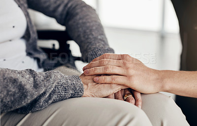 Buy stock photo Cropped shot of a female caregiver comforting a senior woman