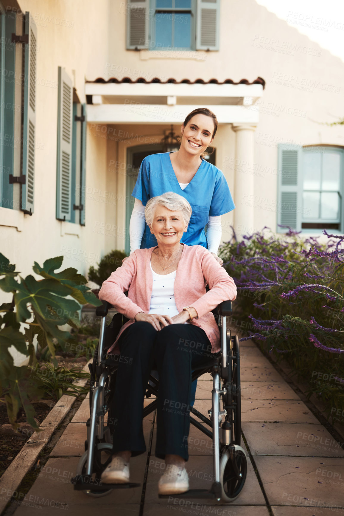 Buy stock photo Senior woman, wheelchair and portrait of caregiver in healthcare support or garden walk at nursing home. Happy elderly female and nurse helping patient or person with a disability by retirement house