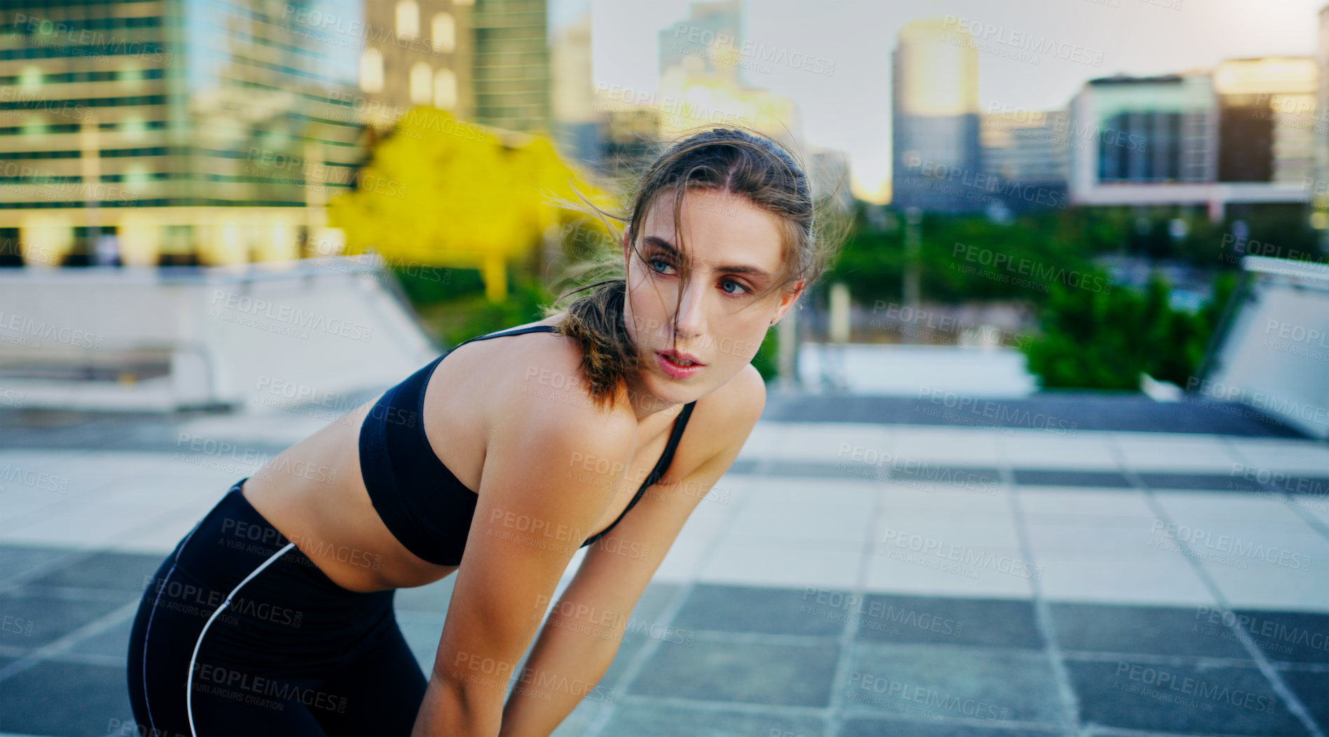 Buy stock photo Woman, athlete and breathing after run with city background for fitness, health and exercise in town for summer. Female person, runner and training in urban for marathon, competition and wellness