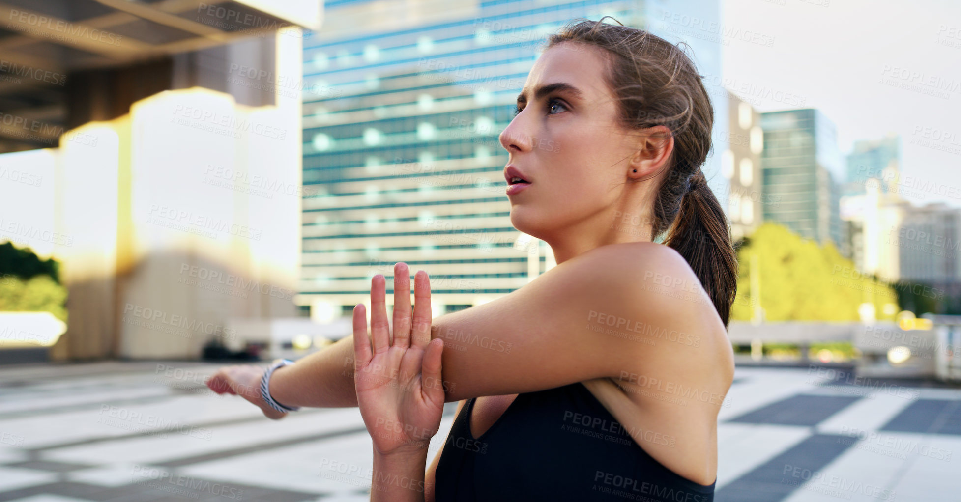 Buy stock photo Woman, athlete and stretching after run with city background for fitness, health and exercise in town for summer. Female person, runner and training in urban for marathon, competition and wellness