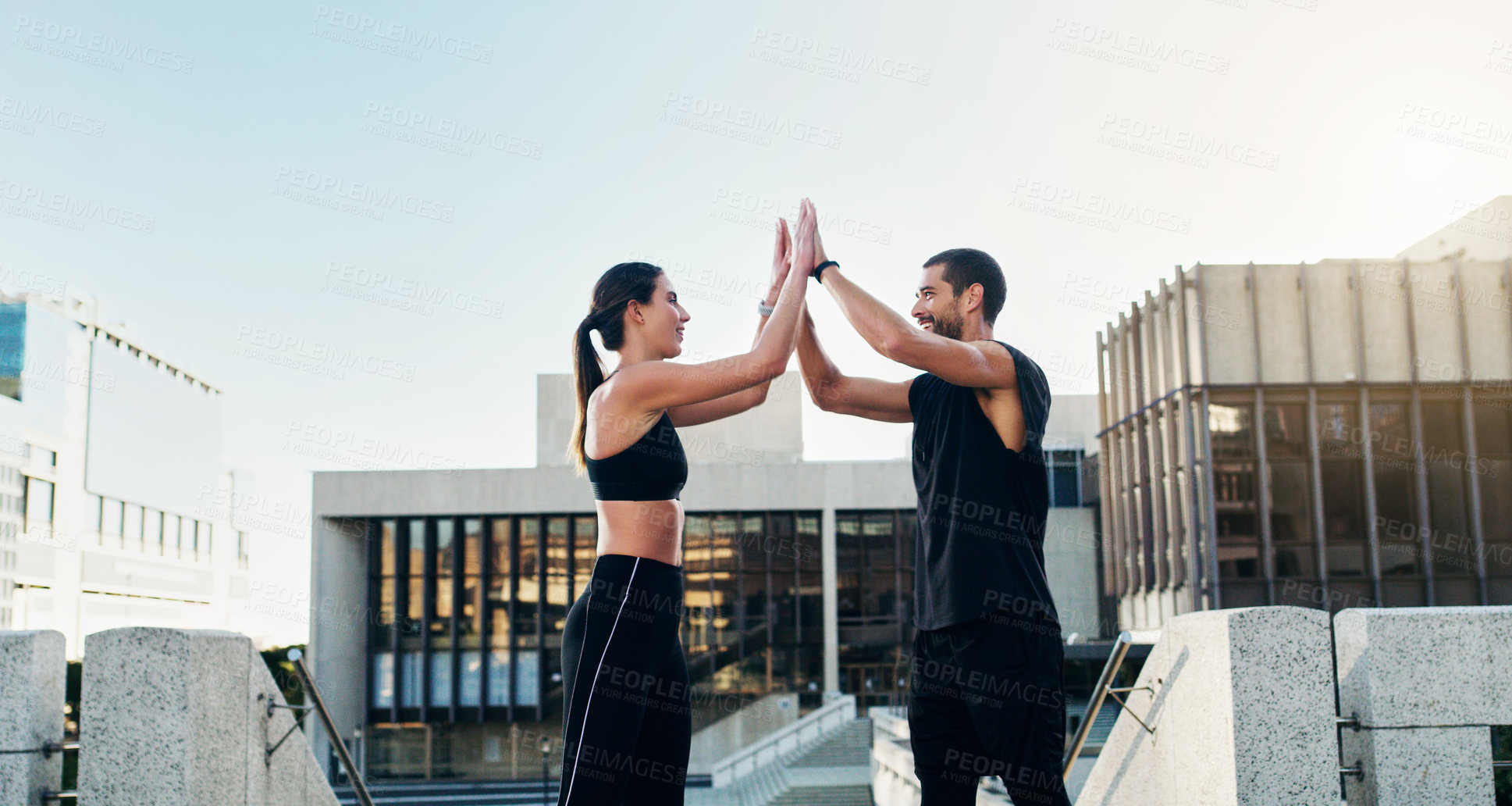 Buy stock photo Man, woman and high five in city for fitness, workout and exercise with partnership for training. Friends, coach and personal trainer outdoor for wellness, success and teamwork in spring time