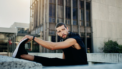 Buy stock photo Stretching legs, workout and man in city for warm up, performance exercise or endurance training. Outdoor, sports and athlete for parkour preparation, fitness challenge or cardio on rooftop building