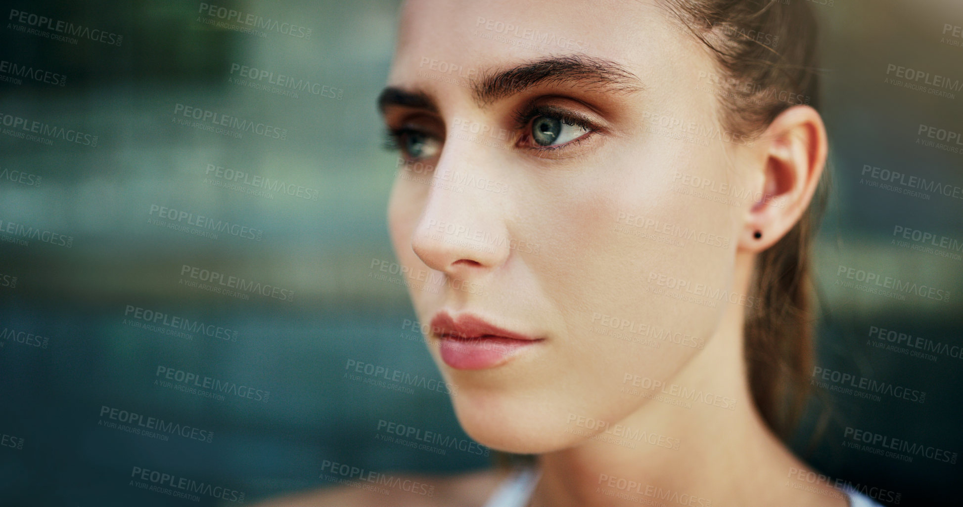 Buy stock photo Shot of a young woman going for a workout in the city