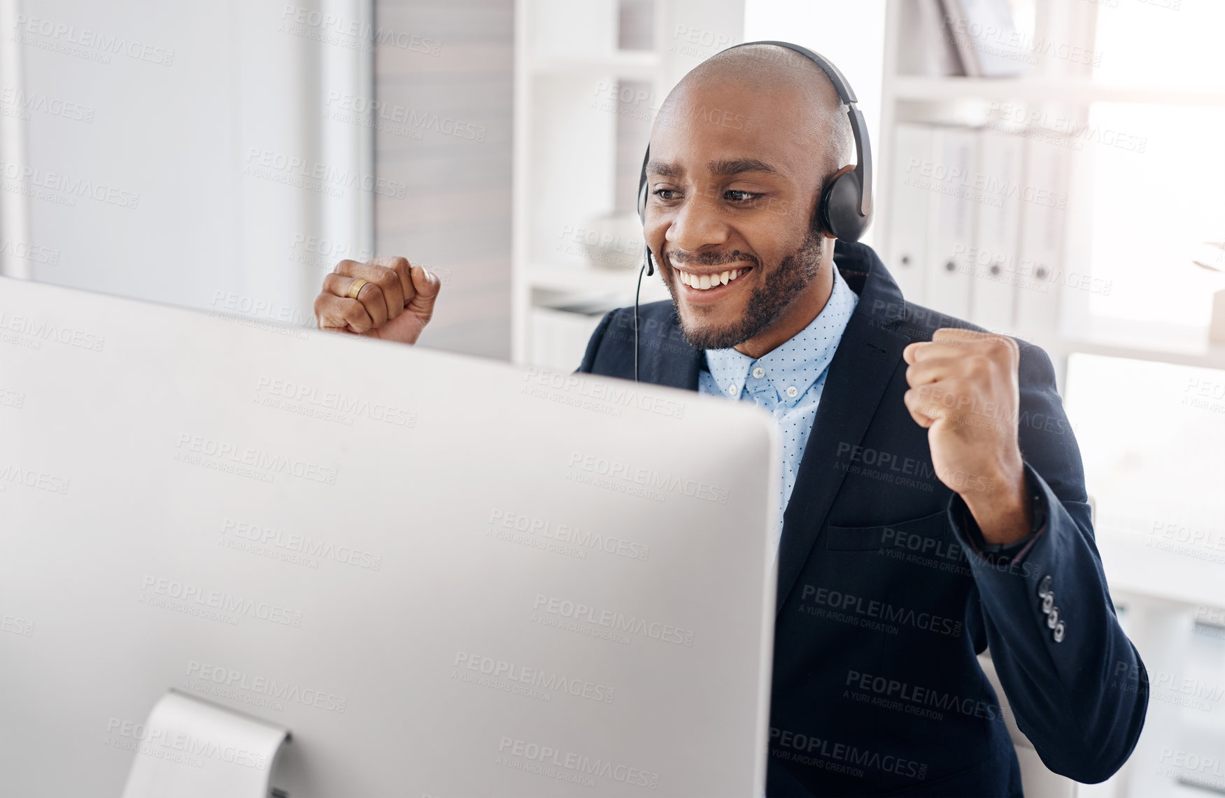 Buy stock photo Cheering, excited and man in call centre, computer and headset for customer support and notification. Office, achievement and bonus for sales, smile and black person with prize and telemarketing
