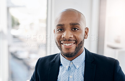 Buy stock photo Cropped shot of a handsome young businessman smiling at the camera