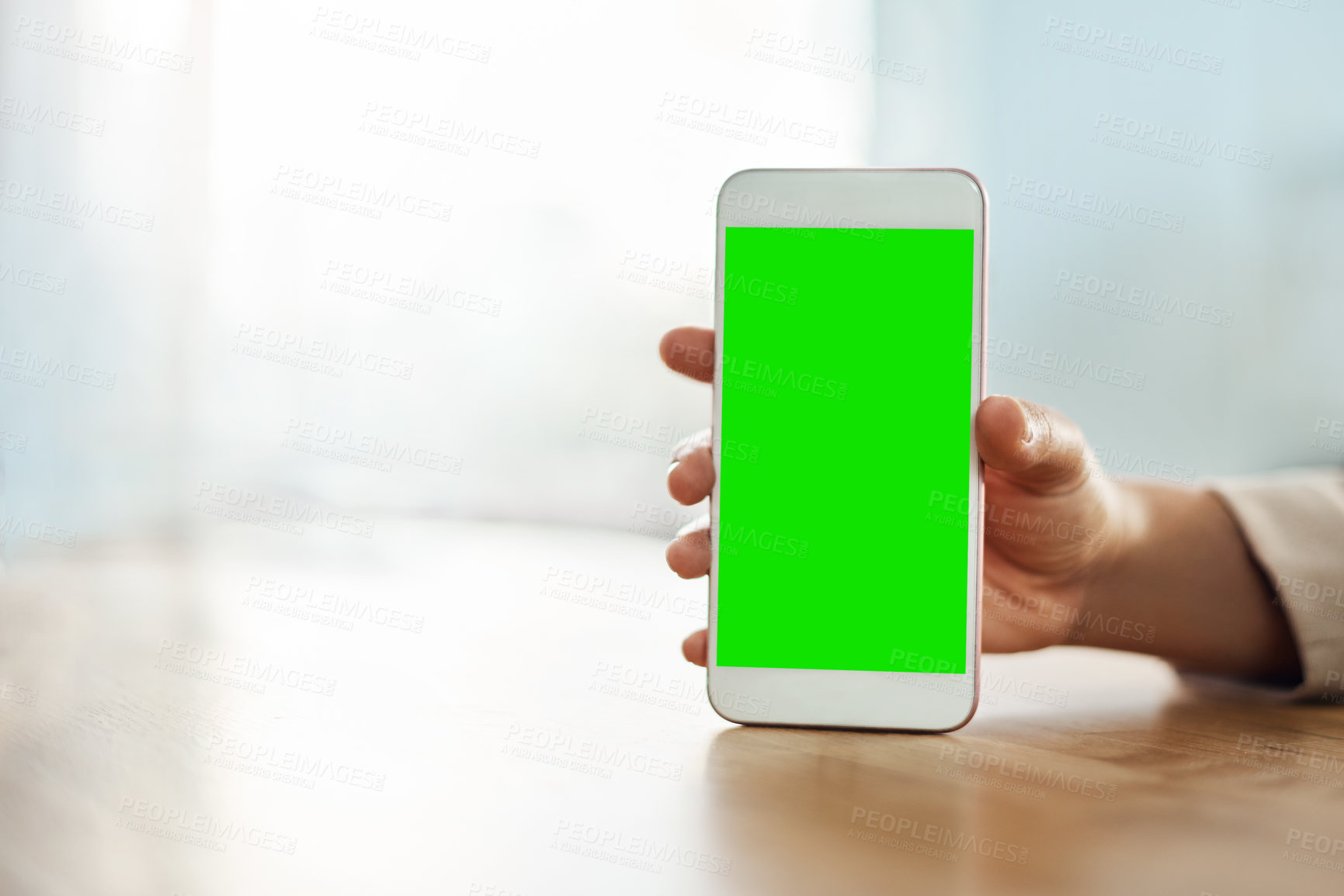 Buy stock photo Shot of an unrecognizable  businesswoman using a mobile phone in her office