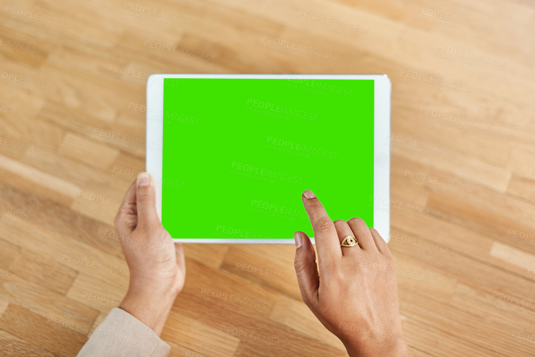 Buy stock photo Green screen, hands and tablet with business person at desk of office for advertising or marketing. App, mockup space and social media with corporate employee in professional workplace from above