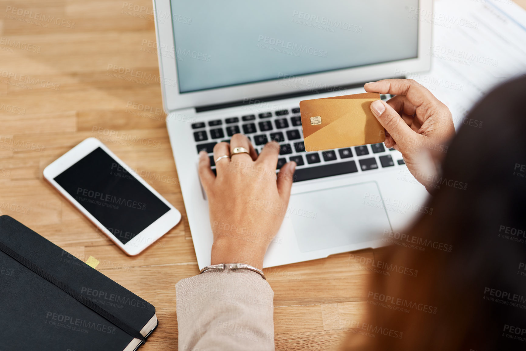 Buy stock photo Business expense, credit card and laptop with hands of person at desk in office for flight booking. Bank, computer and online payment with corporate employee in professional workplace from mockup