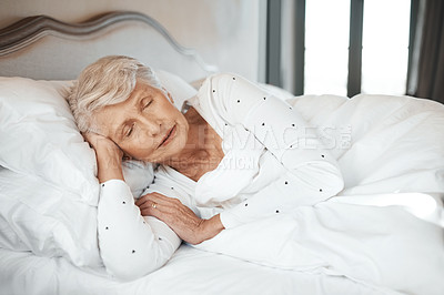 Buy stock photo Shot of a senior woman sleeping in bed in a nursing home