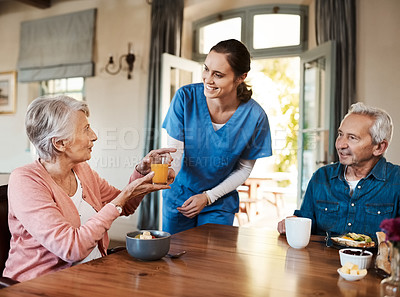 Buy stock photo Juice, helping and nurse with senior couple in assisted living facility with healthy breakfast for nutrition. Happy, talking and caregiver with elderly patients for fruit drink in retirement home.