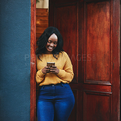 Buy stock photo Phone, door and black woman in front of home with social media, smile and streaming or typing. Smartphone, property and female travel influencer with online review for accommodation or rental app
