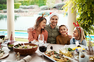 Buy stock photo Shot of a family spending Christmas day together 