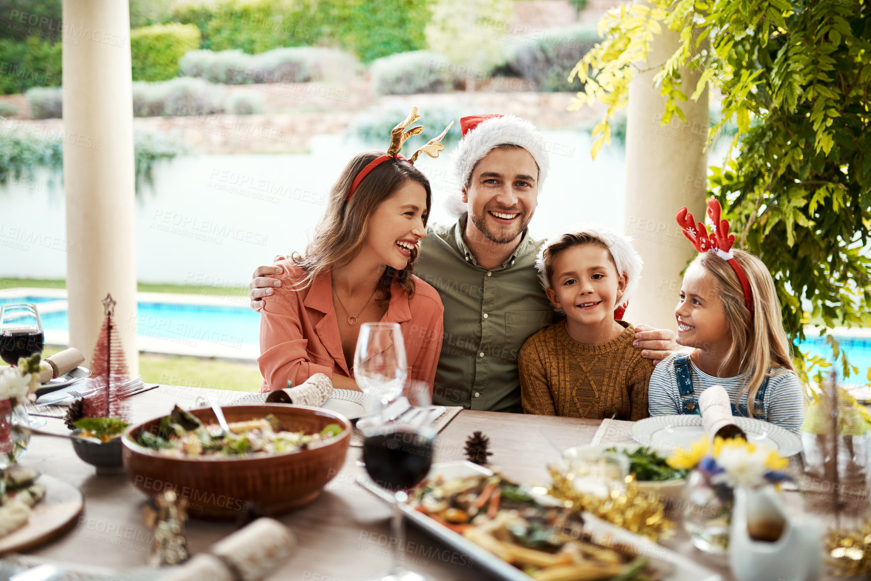 Buy stock photo Shot of a family spending Christmas day together 