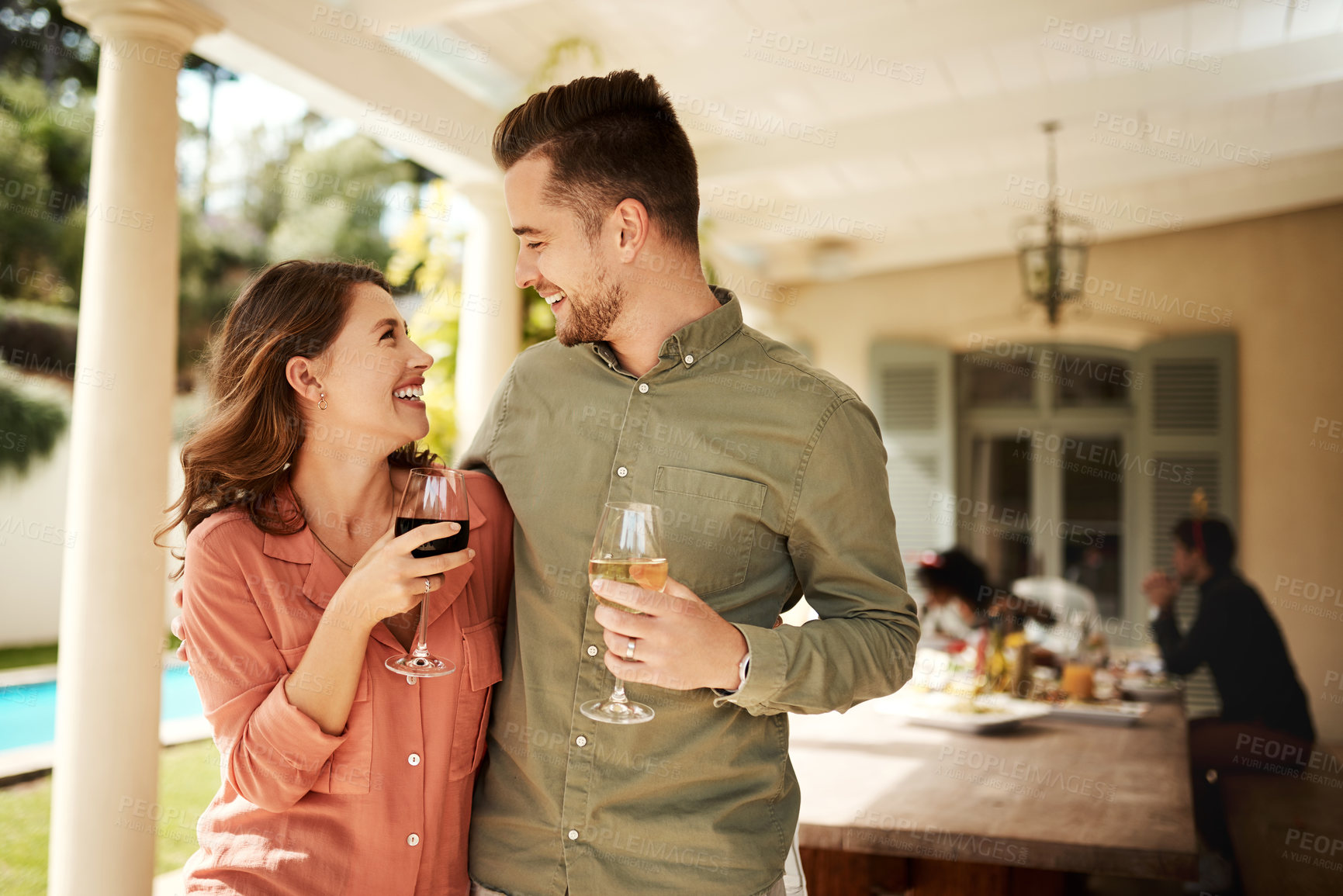 Buy stock photo Cheers, wine and couple laughing at holiday home for anniversary celebration with love together. Toast, romantic and young man and woman with alcohol drink at vacation or weekend trip accommodation.