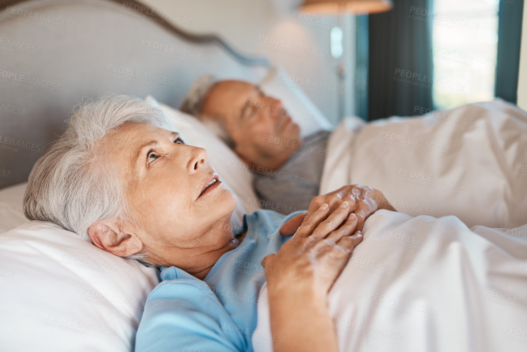 Buy stock photo Snoring, bedroom and senior couple with reaction, insomnia and awake with stress, upset and emotion. Pensioner, mature woman and elderly man in bed, home and thinking with retirement and boredom