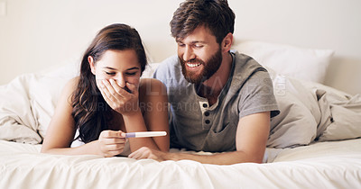 Buy stock photo Couple, bedroom and pregnancy test, happy and excited for future family, life, love and happiness together. Positive results, man with pregnant woman on bed with good news, surprise and shock in home