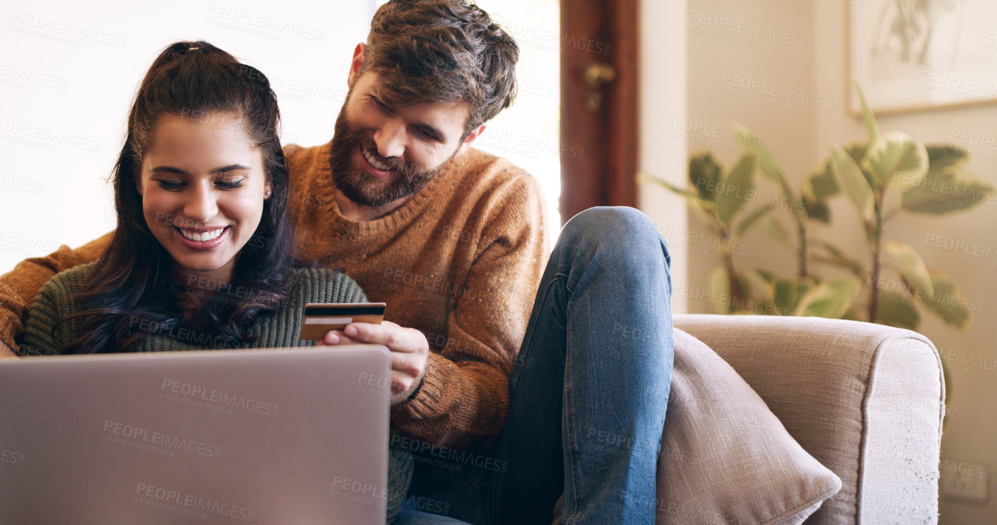 Buy stock photo Young couple, credit card and online shopping with virtual wallet or ecommerce or order and sitting on couch at home. Smiling, woman and man using banking service or make secure internet payment