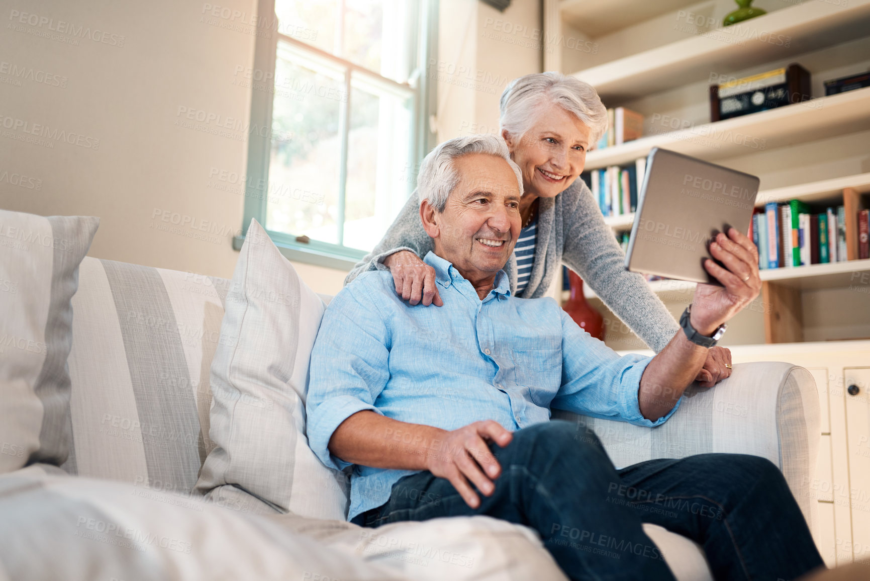 Buy stock photo Senior couple, home or video call on tablet on social media for network, picture or conversation together. Smile, elderly man or old woman speaking online for communication, talking or virtual chat