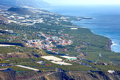 Buy stock photo Above landscape view of fruit plantations outside La Llanos city, La Palma, Spain. Tropical scenic hills, sea and ocean, farming and architecture town buildings. Travel abroad to tourism destination