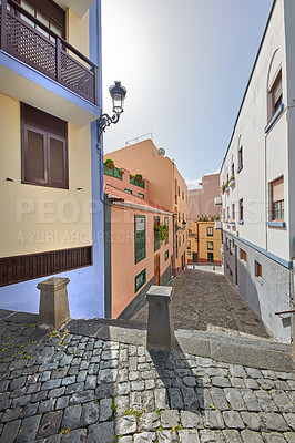 Buy stock photo Street view of colorful residential houses or buildings in a quiet alleyway in Santa Cruz, La Palma, Spain. Historical spanish and colonial architecture in a town and famous tourism destination