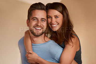Buy stock photo Portrait, smile and couple hug in home for bonding, piggyback and laughing together for care. Face, happy man and woman embrace for healthy relationship, support and connection in apartment for love