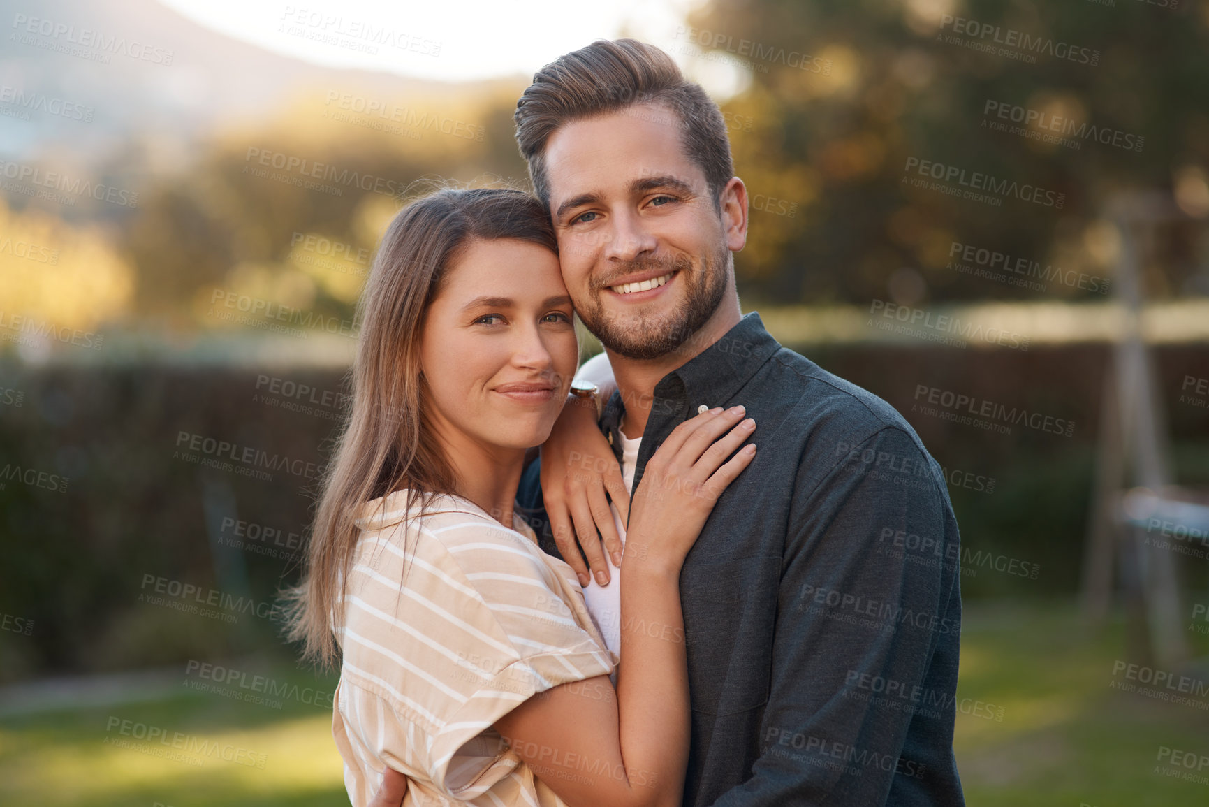Buy stock photo Nature, smile and portrait of couple with hug on outdoor date for romance, love and anniversary. Man, woman and relationship with happiness and embracing for bonding together in garden on holiday.
