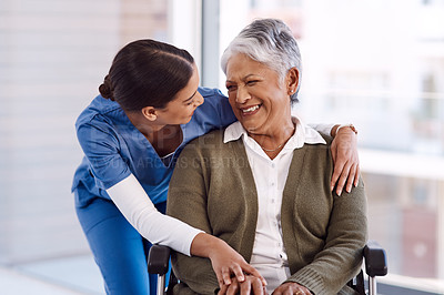 Buy stock photo Healthcare, disability and a nurse hugging an old woman in a wheelchair during a nursing home visit. Medical, hug and funny with a laughing female medicine professional talking to a senior resident 