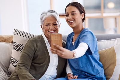 Buy stock photo Nurse, selfie and old woman in nursing home with smile or happiness for profile pictures or retirement. Women, photography or happy caregiver relaxing or smiling with elderly person for wellness
