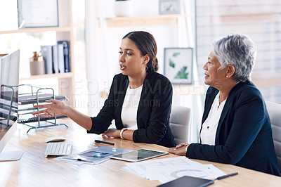 Buy stock photo Mentor, teamwork or business women with computer talking, speaking or planning a project in office. Technology, collaboration or senior manager with female intern for strategy training or coaching