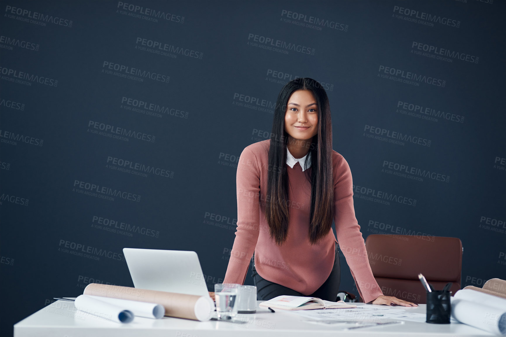 Buy stock photo Portrait of an attractive young female architect working in her office