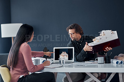 Buy stock photo Architect, man and woman with model laptop in office to point at screen, brainstorming or decision at job. People, ideas and partnership at property development agency for teamwork, advice or project