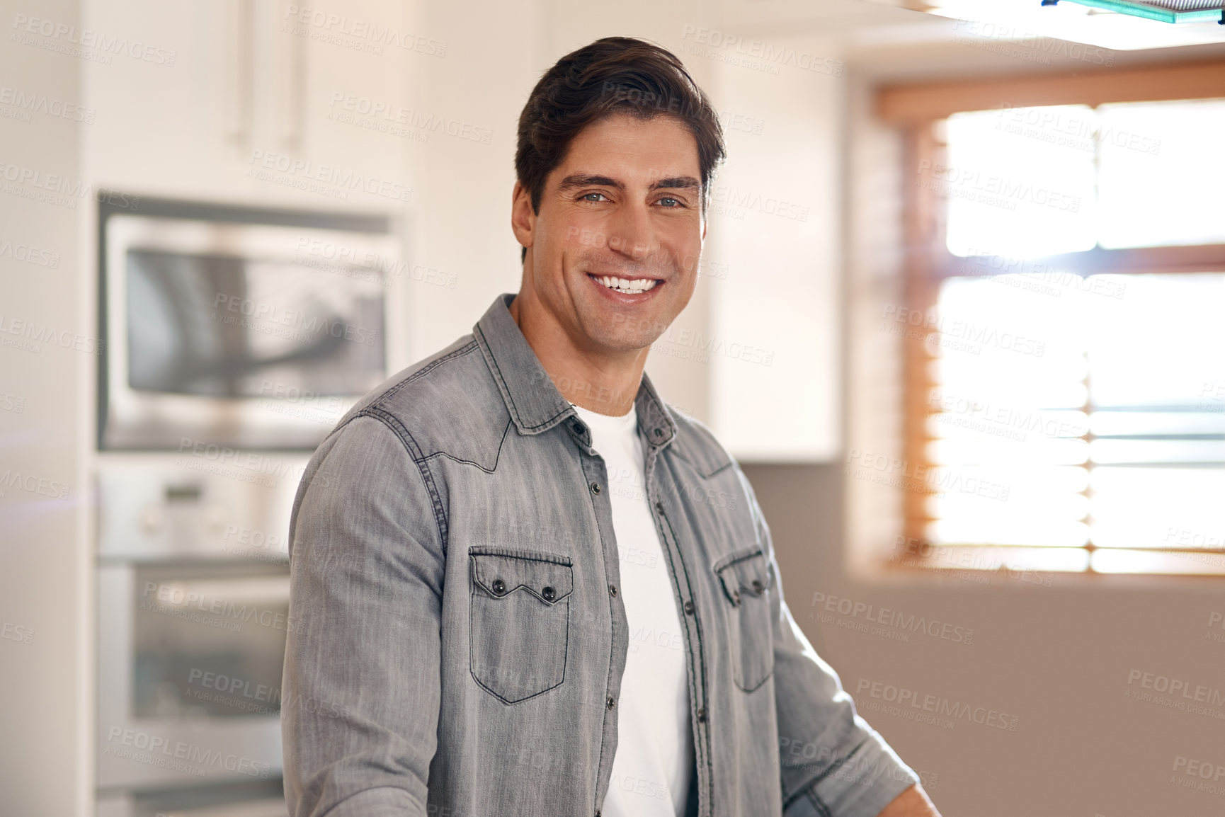 Buy stock photo Man, portrait and happy in kitchen of new apartment with pride for future, investment and home owner. Male person, realtor and smile in house for real estate, mortgage and property for sale 