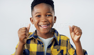 Buy stock photo Portrait of an adorable little boy posing against a white background