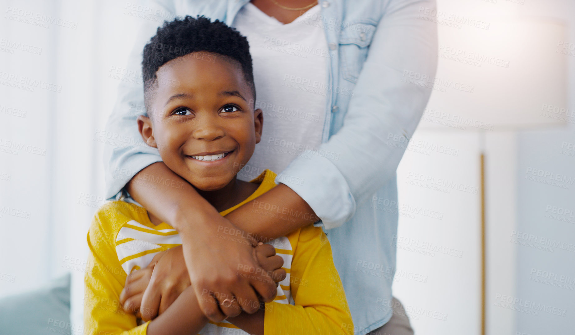 Buy stock photo Portrait of an adorable little boy bonding and spending time with his mother at home