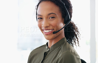 Buy stock photo Shot of a young woman using a headset in a modern office