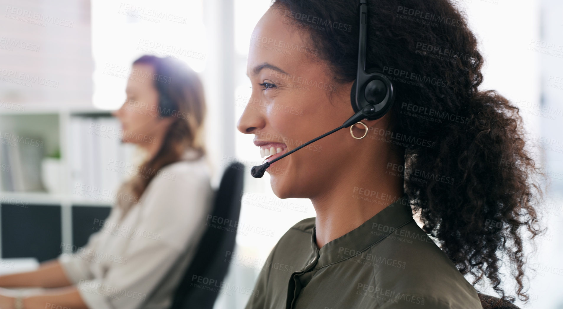 Buy stock photo Shot of a young woman using a headset in a modern office