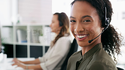 Buy stock photo Woman, portrait and happy in call center for customer service, telemarketing and FAQ in office. Female consultant, smile and headset at desk with team, communication and technical support with tech