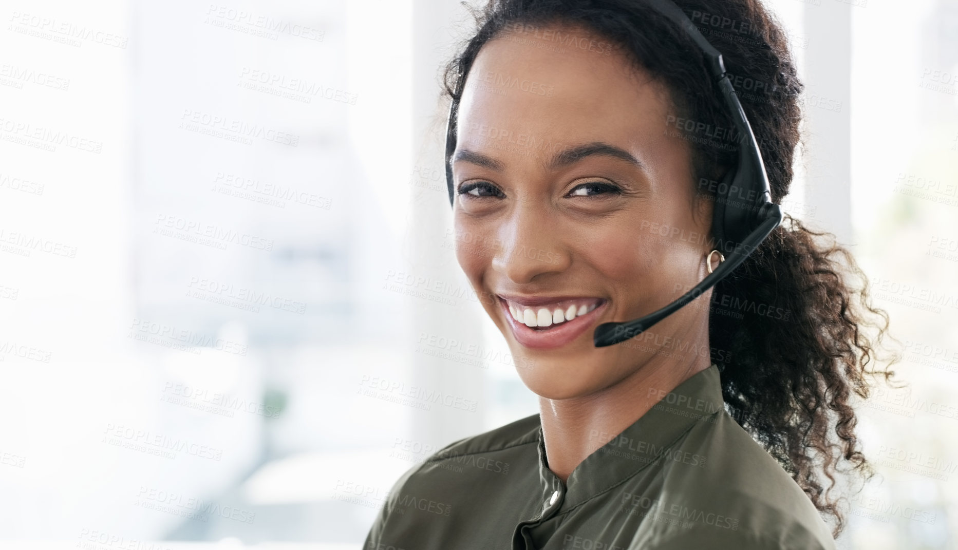 Buy stock photo Shot of a young woman using a headset in a modern office