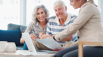 Buy stock photo Shot of a senior couple meeting with a consultant to discuss paperwork at home