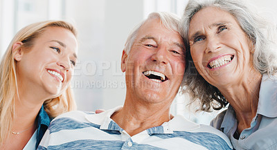 Buy stock photo Shot of a young woman spending quality time with her parents at home