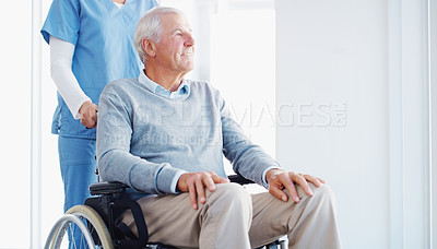 Buy stock photo Shot of a senior man in a wheelchair being cared for by a nurse
