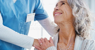 Buy stock photo Shot of a senior woman being cared for by a nurse