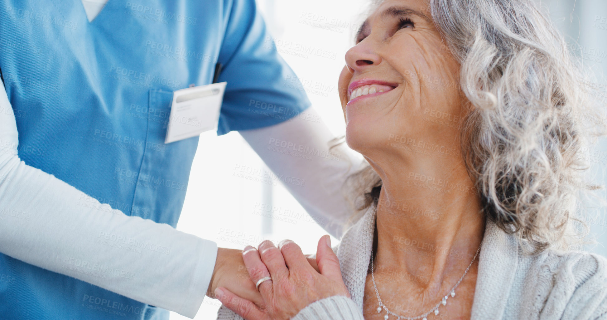 Buy stock photo Shot of a senior woman being cared for by a nurse