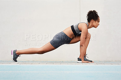Buy stock photo Runner, fitness and woman athlete in set on track, outdoor and exercise for sports competition. Race, kneel position and field cardio event for female person, workout and sprint for olympic training