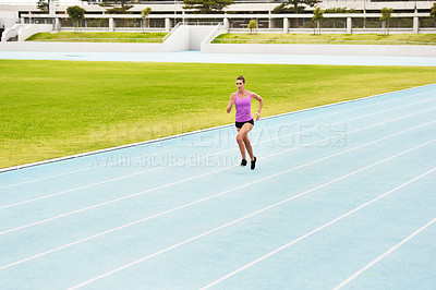 Buy stock photo Fitness, sports woman and running on race track for athletics, sprint challenge or competition training in stadium. Runner, exercise and female person for performance, endurance or cardio workout