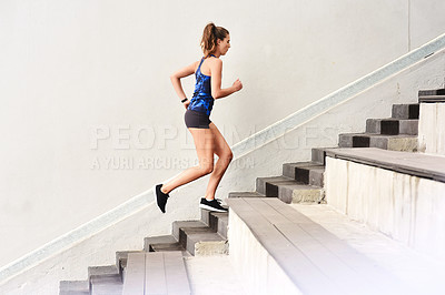 Buy stock photo Female runner, stairs and cardio for sports, exercise and fit on steps for endurance, physical and activity. Healthy, woman and training in running, wellness and muscles for strong, body and mind