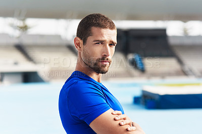 Buy stock photo Portrait, confident man and athlete at stadium for sport, wellness or exercise for body health in France. Face, serious runner or race track for fitness, workout or training with arms crossed outdoor