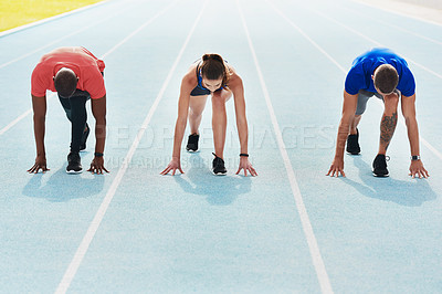 Buy stock photo Running, sports and people on track for race, challenge and competition for field event in stadium. Fitness, health and men and women at start for exercise, workout and sprint for marathon training